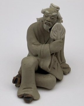 Miniature Ceramic Figurine Mud Man Holding Fan - 2.5"