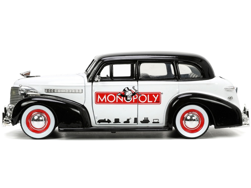 1939 Chevrolet Master Deluxe Black And White "Monopoly" And Mr. Monopoly Diecast Figure "Hollywood Rides" Series 1/24 Diecast Model Car By Jada
