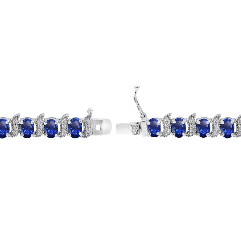 Sterling Silver Created Blue Sapphire 6X4mm Oval And S Tennis Bracelet With White Topaz Accents