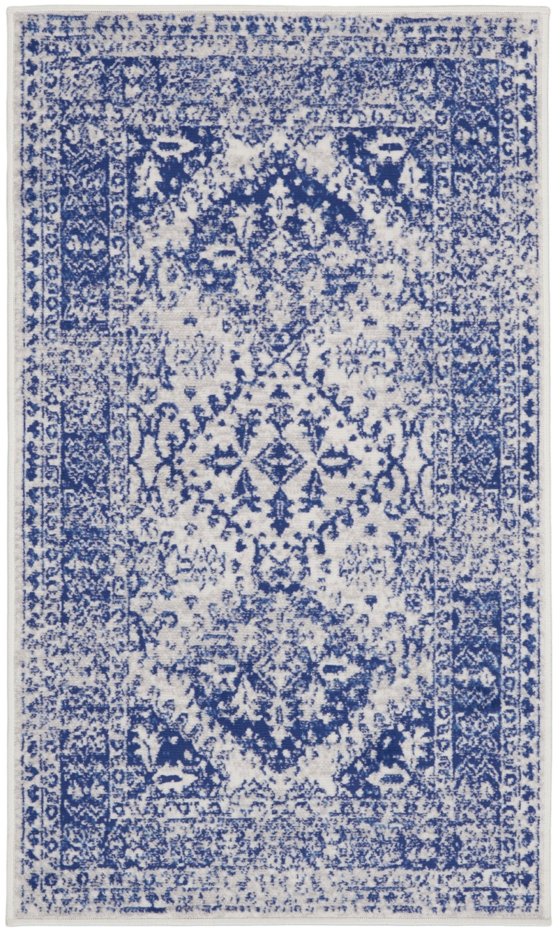 Whimsicle Ivory Navy Polypropylene Farmhouse Area Rug